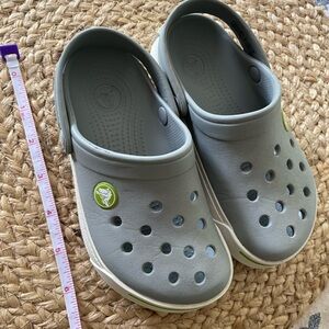Kids 10/11 gray crocs with like green trim. Great used condition!
